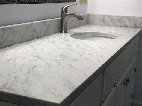 Faucet(s) not included. . Carrara cultured marble
